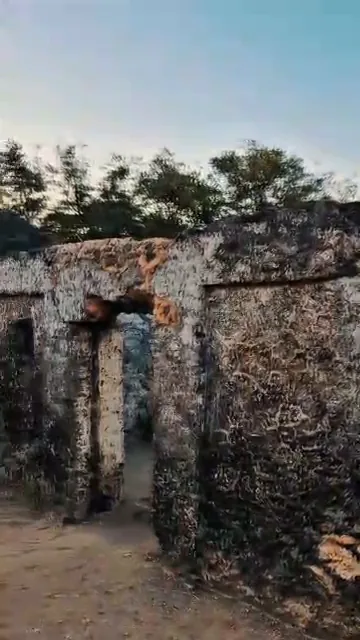 Coral-stone walls and doorway at the Kaole Ruins